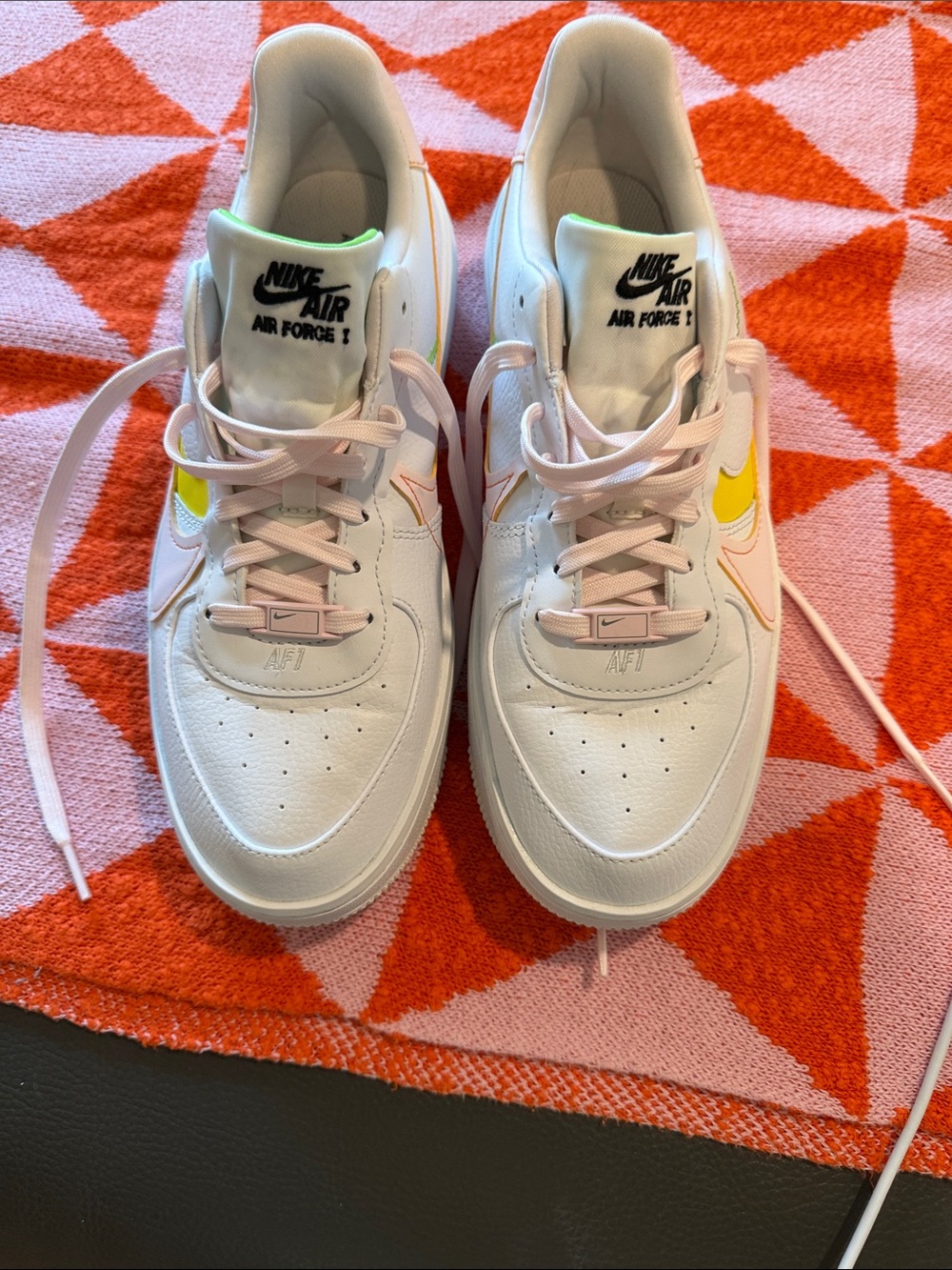 Nike Air Force 1 Women’s White Sneakers with Yellow and Pink Accents